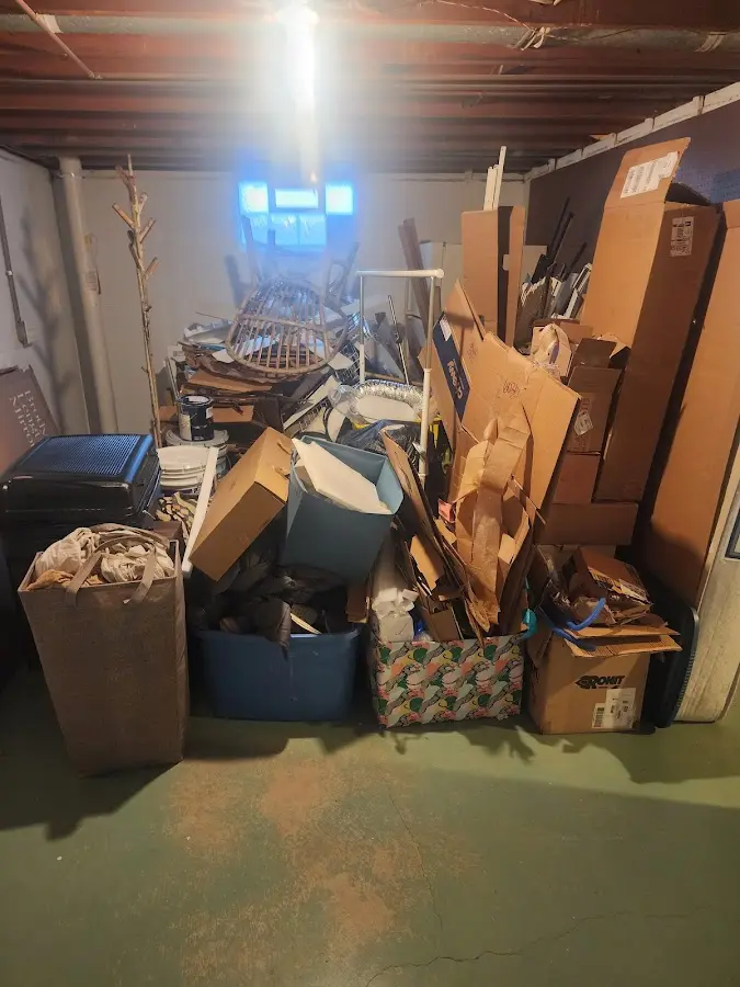 Roll-off dumpster container at job site for 6 Yard Dumpster Rental in Caledonia